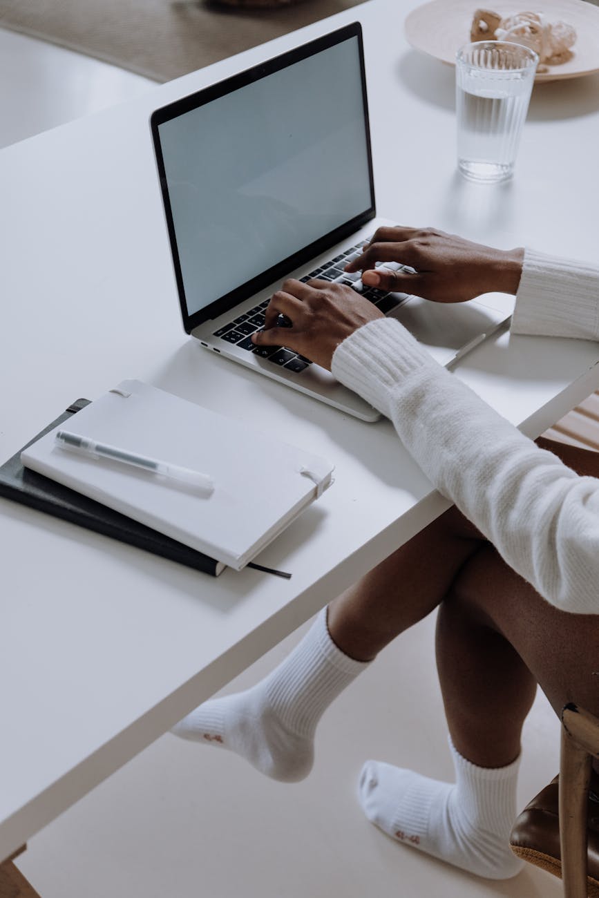 person in white long sleeve shirt using MacBook pro | Things You Should Know Before Freelancing